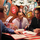 Bradshaw (center) discusses issues of cost with two members of his party.
